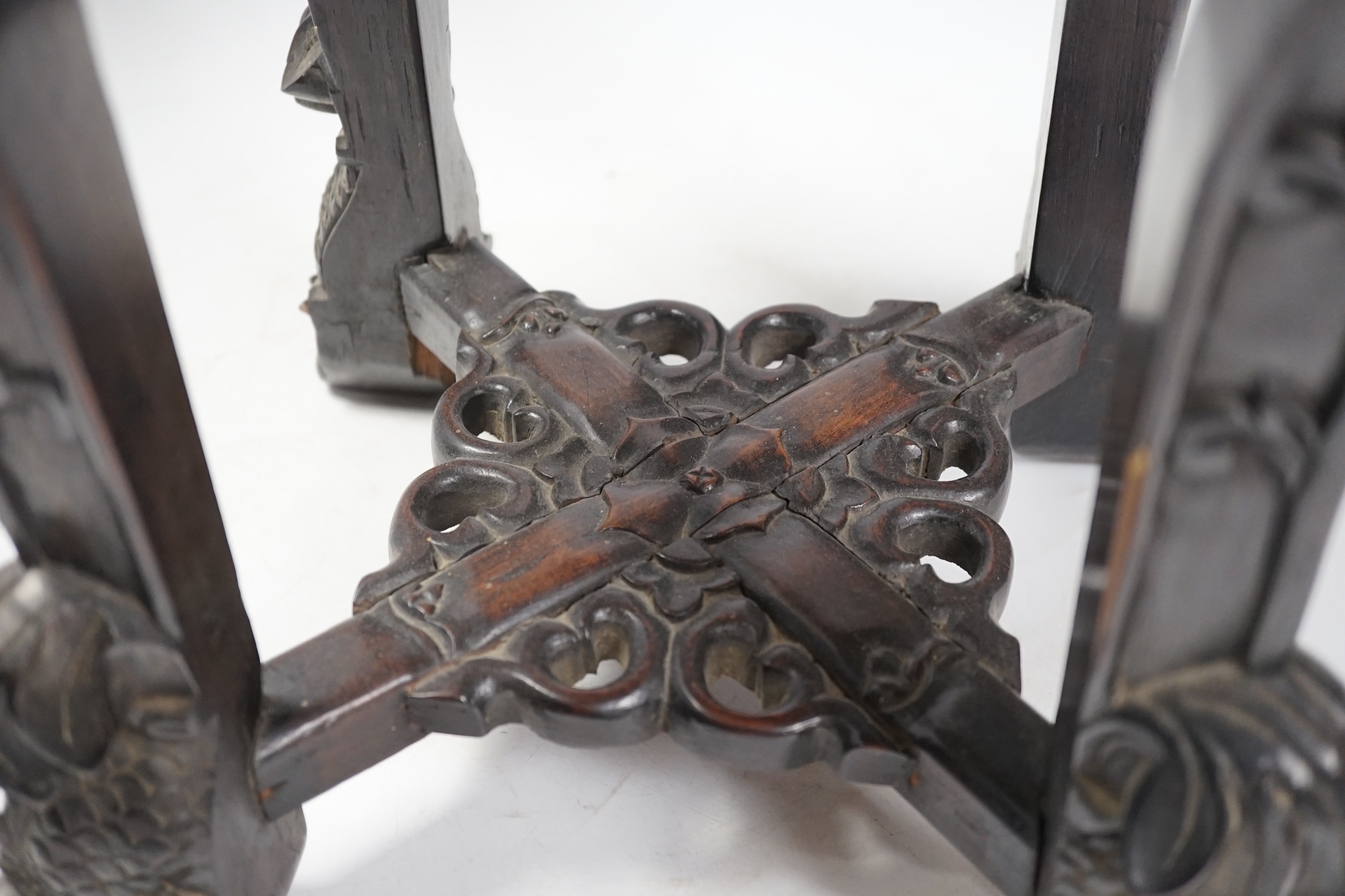 A Chinese hongmu stand, with inset marble top, 42cm high. Condition - poor to fair, section of frieze missing